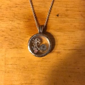 A clutch charm Pandora necklace. That opens and closes like a locket.